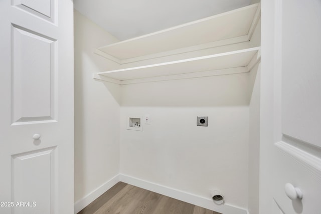 1717 E Union Hills Dr Unit 1033, Phoenix, AZ 85024 - laundry area with hookup for a washing machine, baseboards, wood finished floors, and hookup for an electric dryer