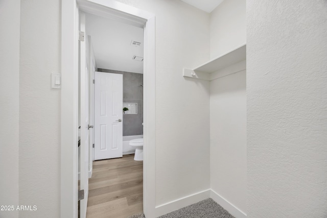 1717 E Union Hills Dr Unit 1033, Phoenix, AZ 85024 - walk in closet with wood finished floors