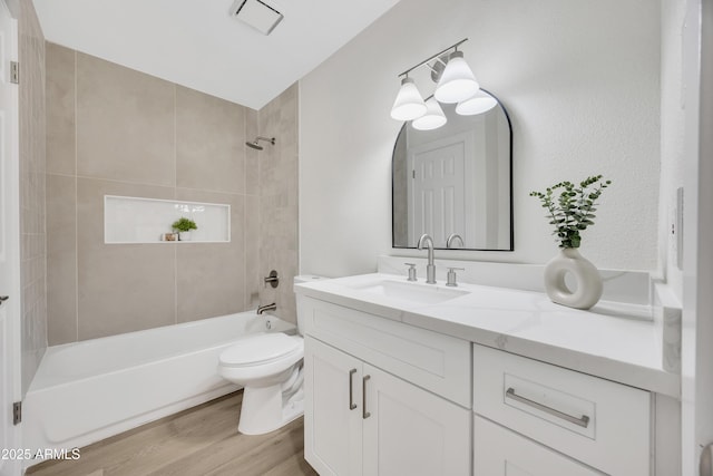 1717 E Union Hills Dr Unit 1033, Phoenix, AZ 85024 - full bathroom with vanity, wood finished floors, toilet, and shower / bath combination