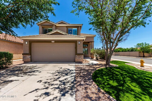37911 N Luke Ln, San Tan Valley, AZ 85140 - view of front facade featuring stucco siding, stone siding, driveway, and a tiled roof