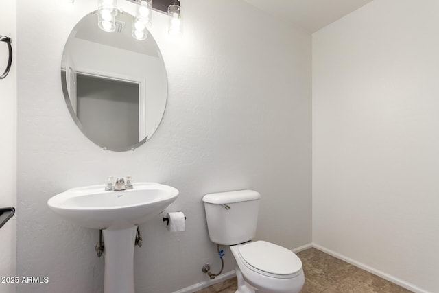 37911 N Luke Ln, San Tan Valley, AZ 85140 - bathroom featuring toilet and baseboards