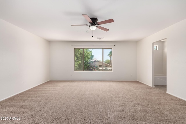 37911 N Luke Ln, San Tan Valley, AZ 85140 - carpeted spare room with healthy amount of natural light, ceiling fan, and baseboards
