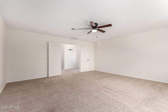 37911 N Luke Ln, San Tan Valley, AZ 85140 - unfurnished room with light carpet, ceiling fan, and baseboards