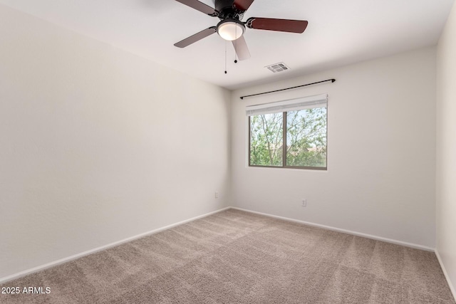 37911 N Luke Ln, San Tan Valley, AZ 85140 - spare room with carpet, baseboards, and a ceiling fan