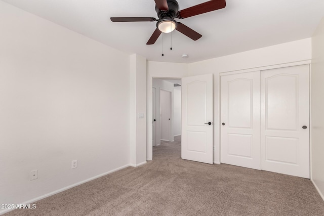 37911 N Luke Ln, San Tan Valley, AZ 85140 - unfurnished bedroom featuring carpet floors, a closet, baseboards, and a ceiling fan