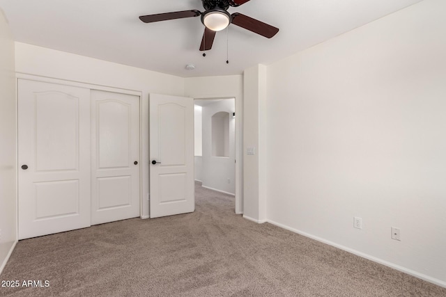 37911 N Luke Ln, San Tan Valley, AZ 85140 - unfurnished bedroom with carpet flooring, baseboards, a closet, and ceiling fan
