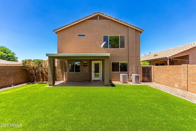 37911 N Luke Ln, San Tan Valley, AZ 85140 - rear view of property featuring stucco siding, central AC unit, and a patio