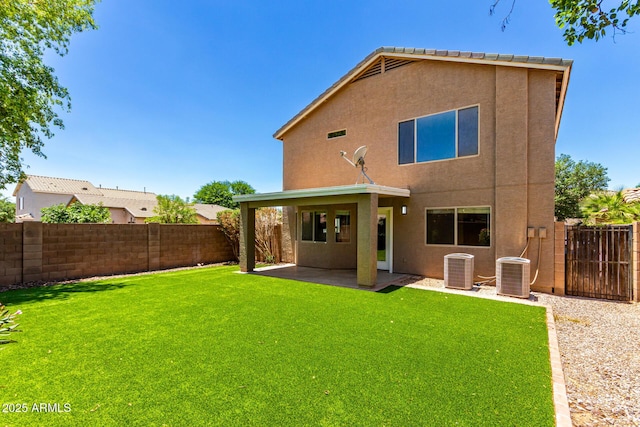 37911 N Luke Ln, San Tan Valley, AZ 85140 - rear view of house featuring stucco siding, central AC unit, and a patio area