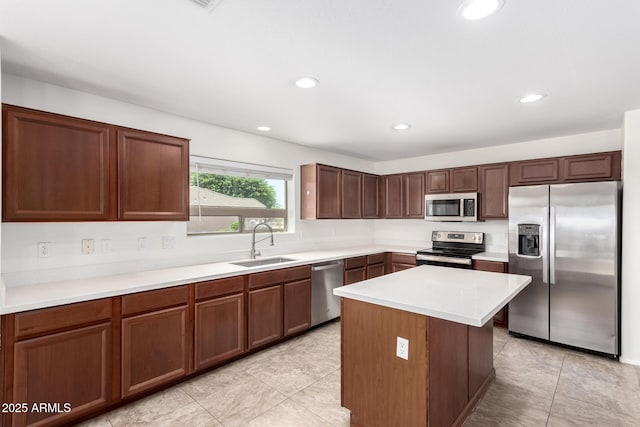 37911 N Luke Ln, San Tan Valley, AZ 85140 - kitchen with stainless steel appliances, a sink, light countertops, recessed lighting, and light tile patterned floors