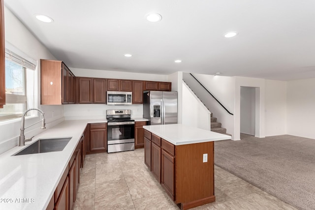 37911 N Luke Ln, San Tan Valley, AZ 85140 - kitchen featuring stainless steel appliances, a sink, a kitchen island, recessed lighting, and open floor plan