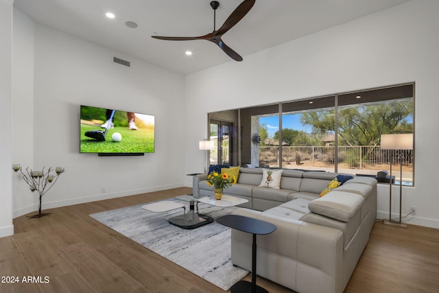 living room with recessed lighting, baseboards, visible vents, a ceiling fan, and wood finished floors