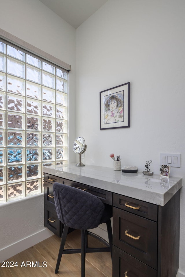 home office with light wood-type flooring