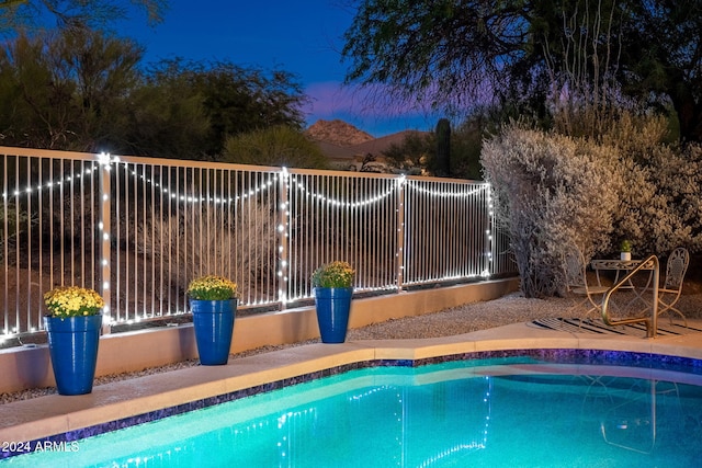 7056 E Mighty Saguaro Way, Scottsdale, AZ 85266 - view of swimming pool with fence