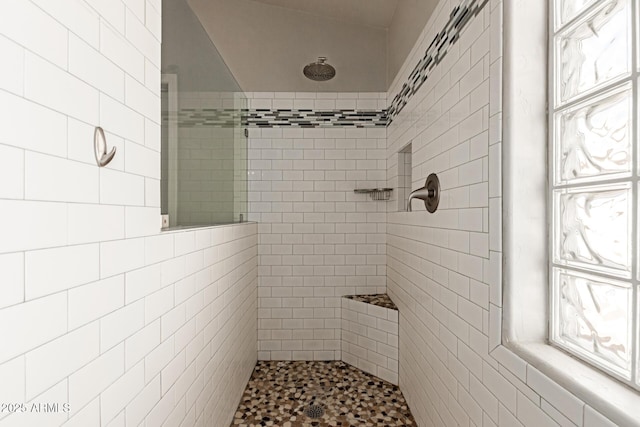 3580 E Kesler Ln, Gilbert, AZ 85295 - bathroom featuring tile walls and a tile shower