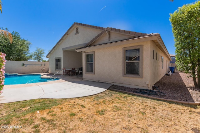 3580 E Kesler Ln, Gilbert, AZ 85295 - rear view of house featuring a fenced in pool, a fenced backyard, a patio area, and stucco siding