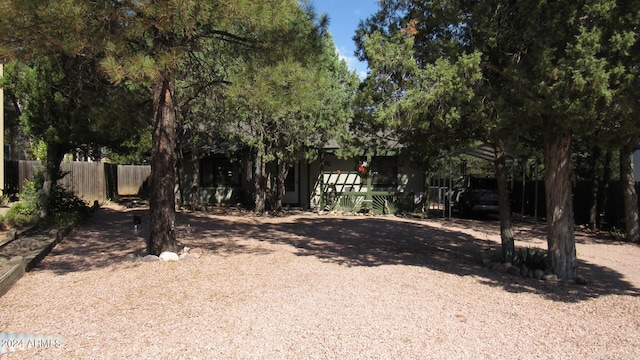 view of front of home featuring a carport