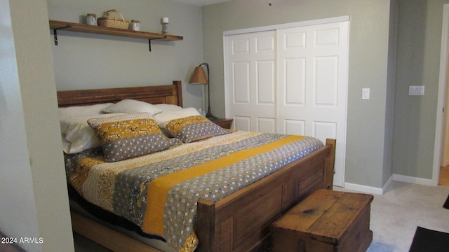 carpeted bedroom with a closet