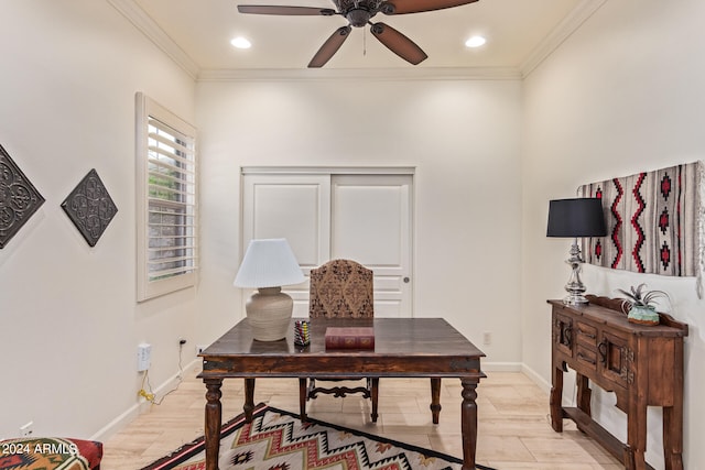 office area featuring ceiling fan, crown molding, and light hardwood / wood-style floors