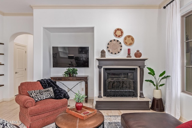 living room featuring light tile patterned flooring and crown molding