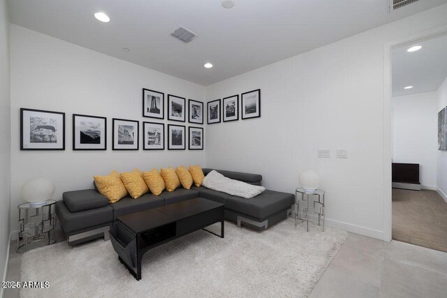 living room featuring visible vents, recessed lighting, and baseboards