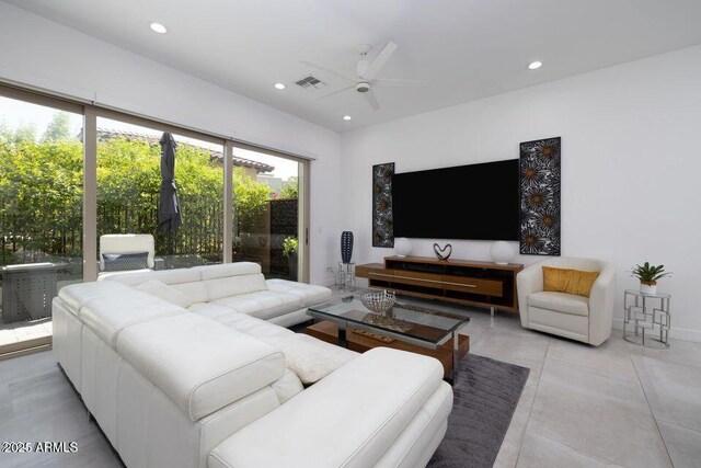 living room with visible vents, ceiling fan, and recessed lighting