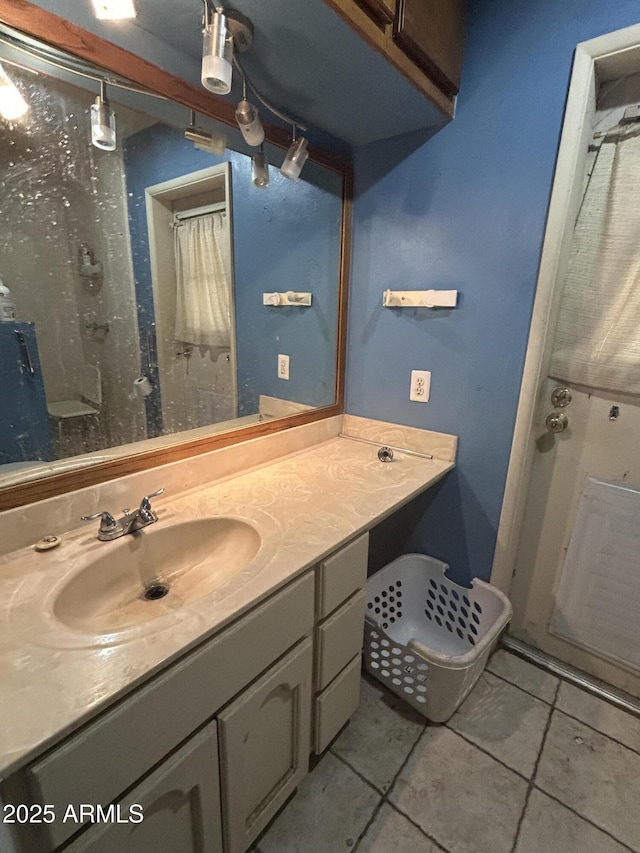 3021 E Saint John Rd, Phoenix, AZ 85032 - bathroom with tile patterned floors and vanity
