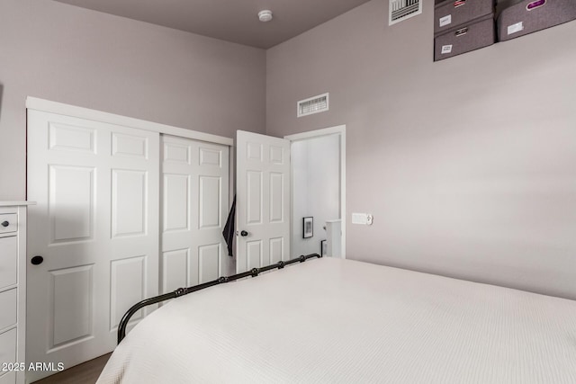 1600 N Saba St Unit 143, Chandler, AZ 85225 - bedroom featuring a closet and dark wood-style flooring
