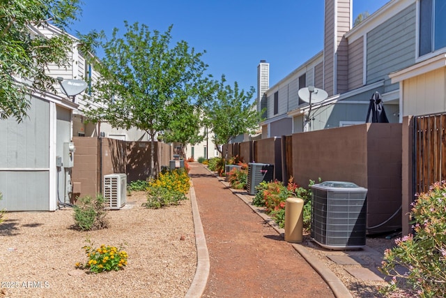 1600 N Saba St Unit 143, Chandler, AZ 85225 - view of home's community featuring fence, a cooling unit, and a residential view