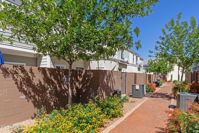 1600 N Saba St Unit 143, Chandler, AZ 85225 - view of home's exterior featuring central air condition unit, fence, and a residential view