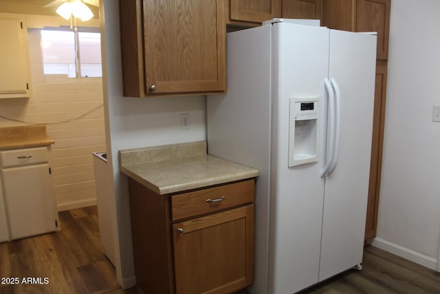 235 N 61st Pl, Mesa, AZ 85205 - kitchen with white fridge with ice dispenser, dark wood-style flooring, light countertops, baseboards, and a ceiling fan