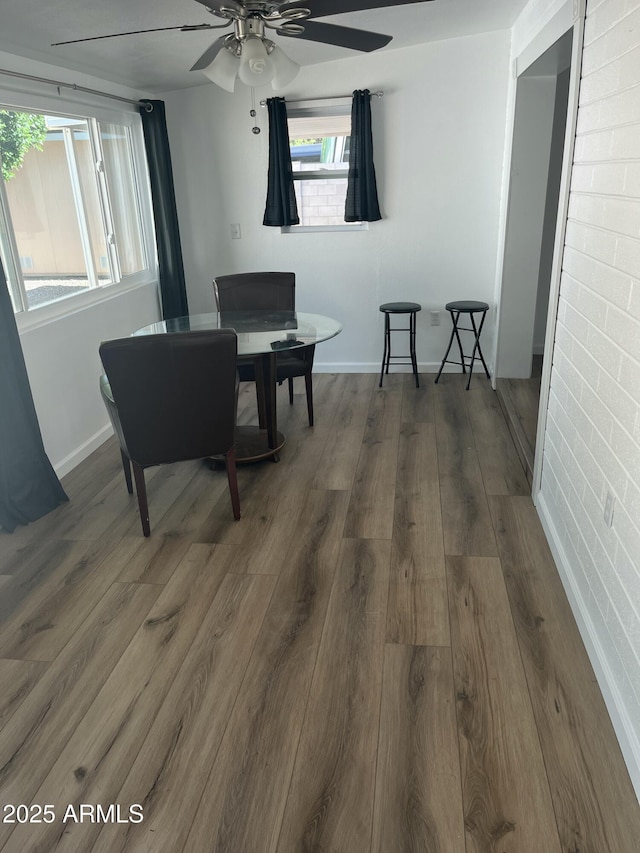 235 N 61st Pl, Mesa, AZ 85205 - dining room with ceiling fan, wood finished floors, and baseboards