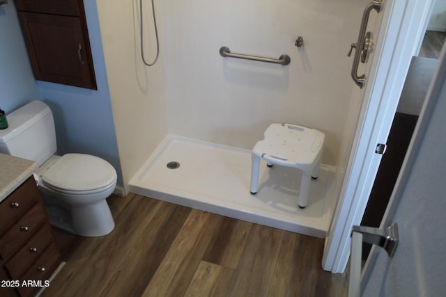 235 N 61st Pl, Mesa, AZ 85205 - full bathroom with wood finished floors, a shower stall, vanity, and toilet