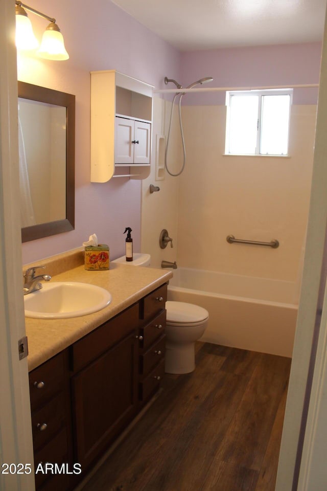 235 N 61st Pl, Mesa, AZ 85205 - full bathroom with wood finished floors, shower / tub combination, vanity, and toilet