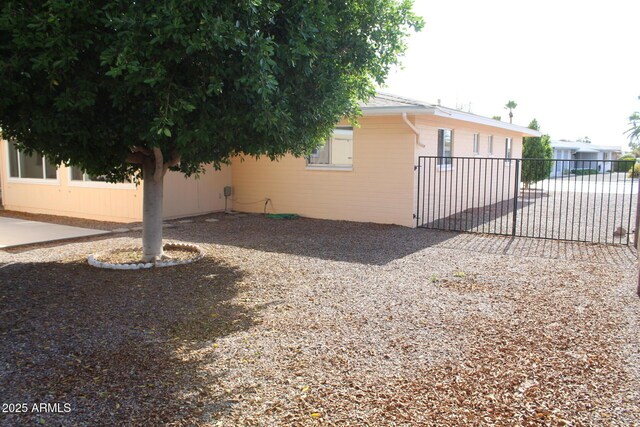 235 N 61st Pl, Mesa, AZ 85205 - view of side of property featuring fence