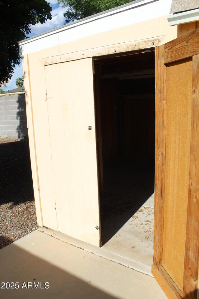 235 N 61st Pl, Mesa, AZ 85205 - view of storm shelter with a shed and an outdoor structure