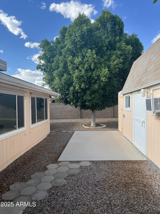 235 N 61st Pl, Mesa, AZ 85205 - fenced backyard featuring a patio area