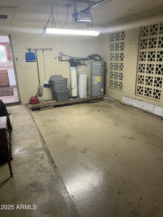 235 N 61st Pl, Mesa, AZ 85205 - garage featuring water heater and a garage door opener