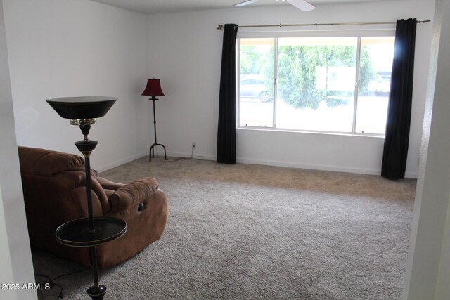 235 N 61st Pl, Mesa, AZ 85205 - living area featuring carpet, ceiling fan, and baseboards