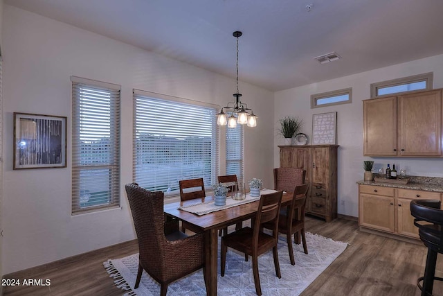 dining room with dark hardwood / wood-style floors