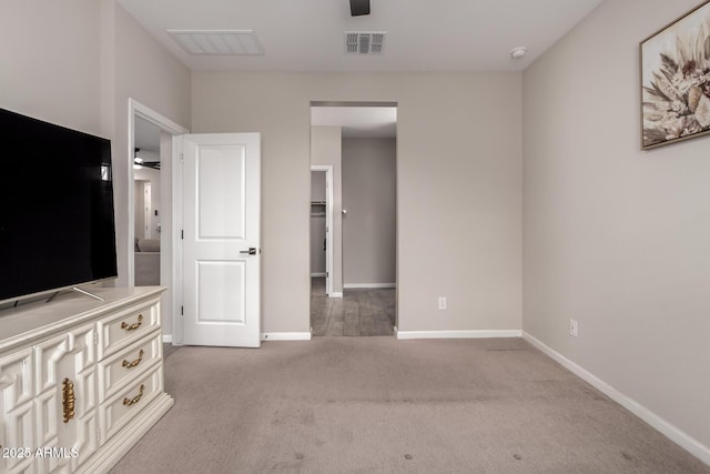 17437 W Via De Luna Dr, Surprise, AZ 85387 - unfurnished bedroom with visible vents, carpet flooring, baseboards, and a spacious closet