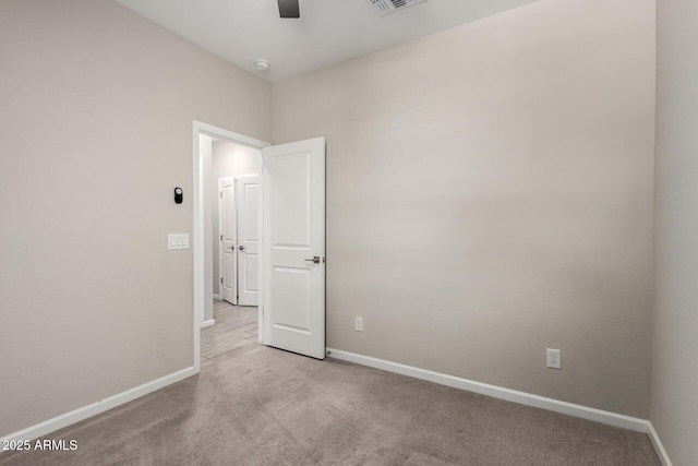 17437 W Via De Luna Dr, Surprise, AZ 85387 - carpeted empty room featuring baseboards, a ceiling fan, and visible vents
