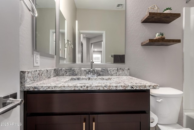 17437 W Via De Luna Dr, Surprise, AZ 85387 - bathroom with vanity, toilet, and visible vents
