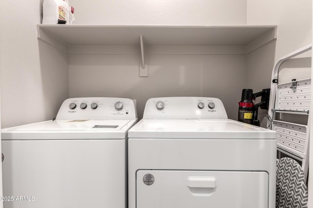 17437 W Via De Luna Dr, Surprise, AZ 85387 - clothes washing area featuring separate washer and dryer and laundry area