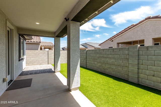 17437 W Via De Luna Dr, Surprise, AZ 85387 - view of yard featuring a patio and a fenced backyard