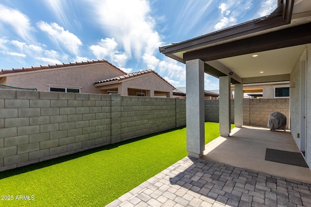 17437 W Via De Luna Dr, Surprise, AZ 85387 - view of yard featuring a patio and a fenced backyard