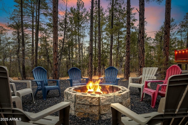 patio terrace at dusk with a fire pit