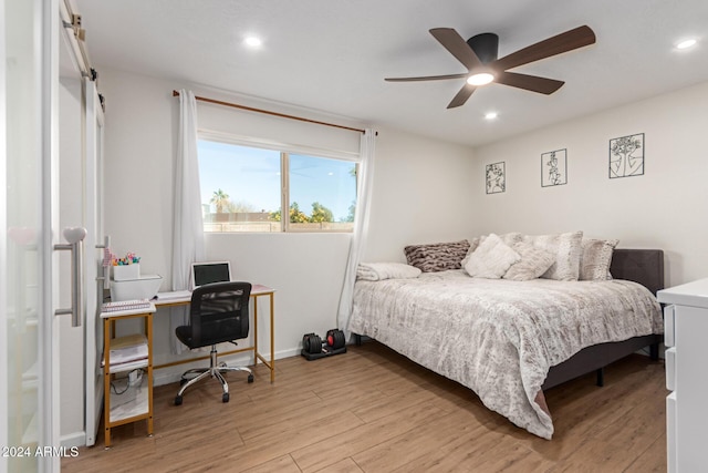 12043 N 46th Ave, Glendale, AZ 85304 - bedroom featuring light wood finished floors, a desk, recessed lighting, a ceiling fan, and baseboards