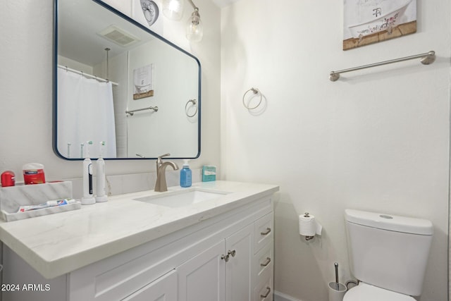12043 N 46th Ave, Glendale, AZ 85304 - bathroom with vanity, toilet, and a shower with shower curtain