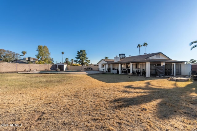 12043 N 46th Ave, Glendale, AZ 85304 - rear view of property with a patio area