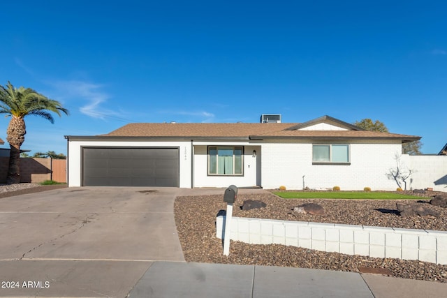 12043 N 46th Ave, Glendale, AZ 85304 - ranch-style house with a garage and driveway